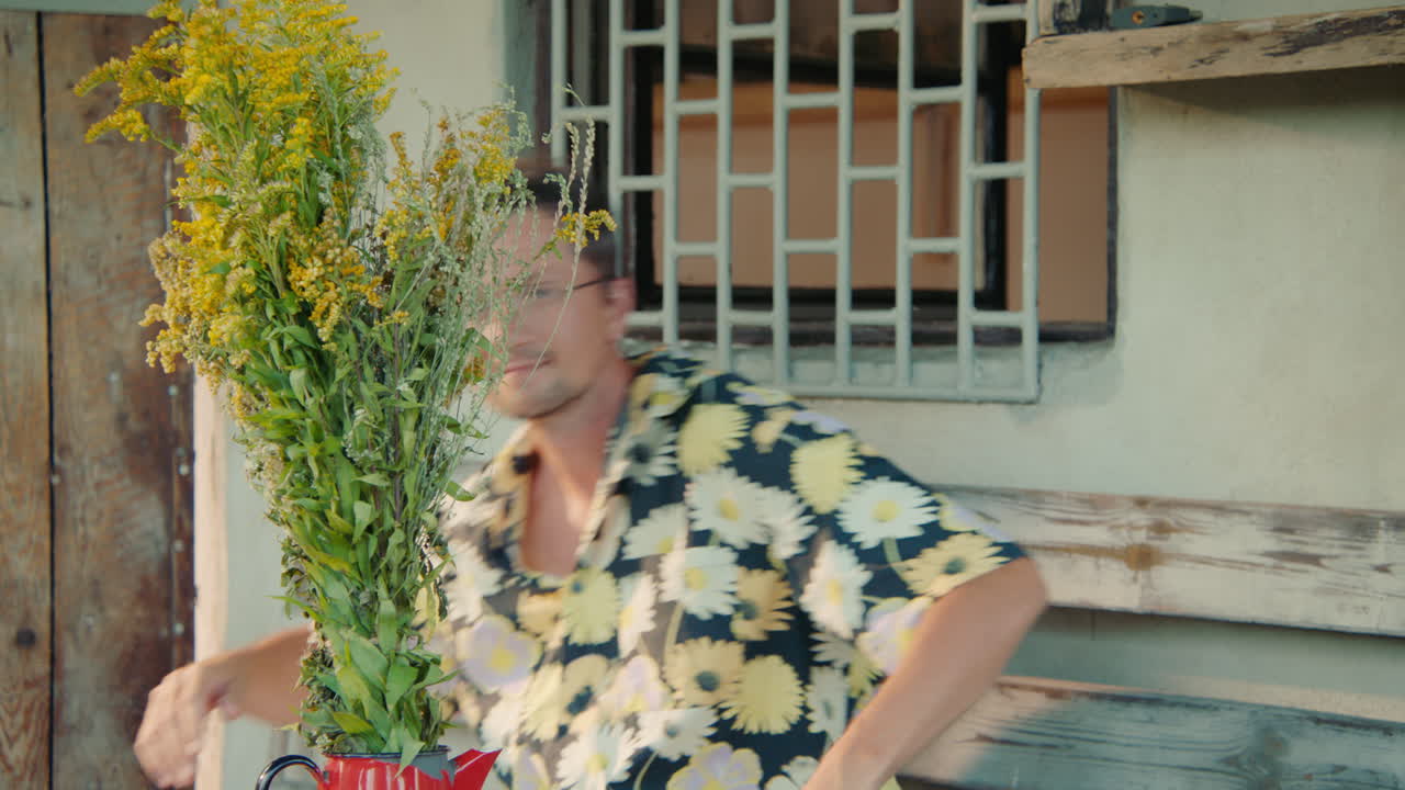 Man Relaxing Outdoors with Flowers