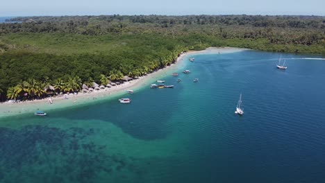 Rotating-aerial-presents-beautiful-Caribbean-tourist-beach-in-Panama