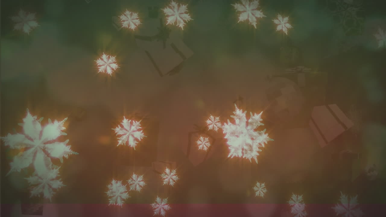 animación de nieve y regalos de navidad cayendo sobre luces borrosas sobre fondo verde