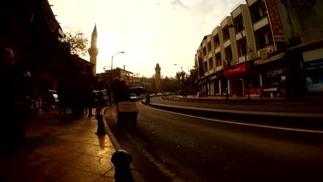 street near eastern marketplace far mosque setting sun urfa