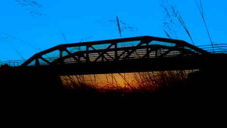 HD-The-Colony,-The-Tribute,-American-Bridge-boom-at-sunrise