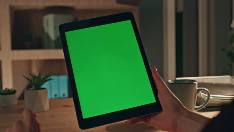 businesswoman hands swiping mockup tablet browsing website at home close up.