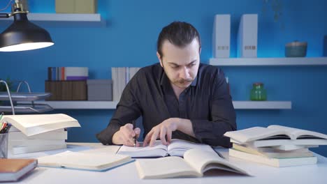 thoughtful historian man reading book, doing research.