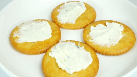 round crackers with herb cheese