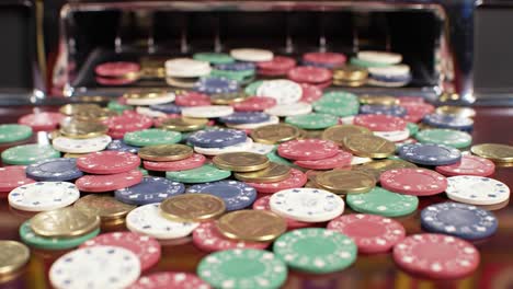 a vibrant cascade of colorful casino chips and coins overflowing from a machine, illustrating the excitement and atmosphere of gambling and gaming entertainment