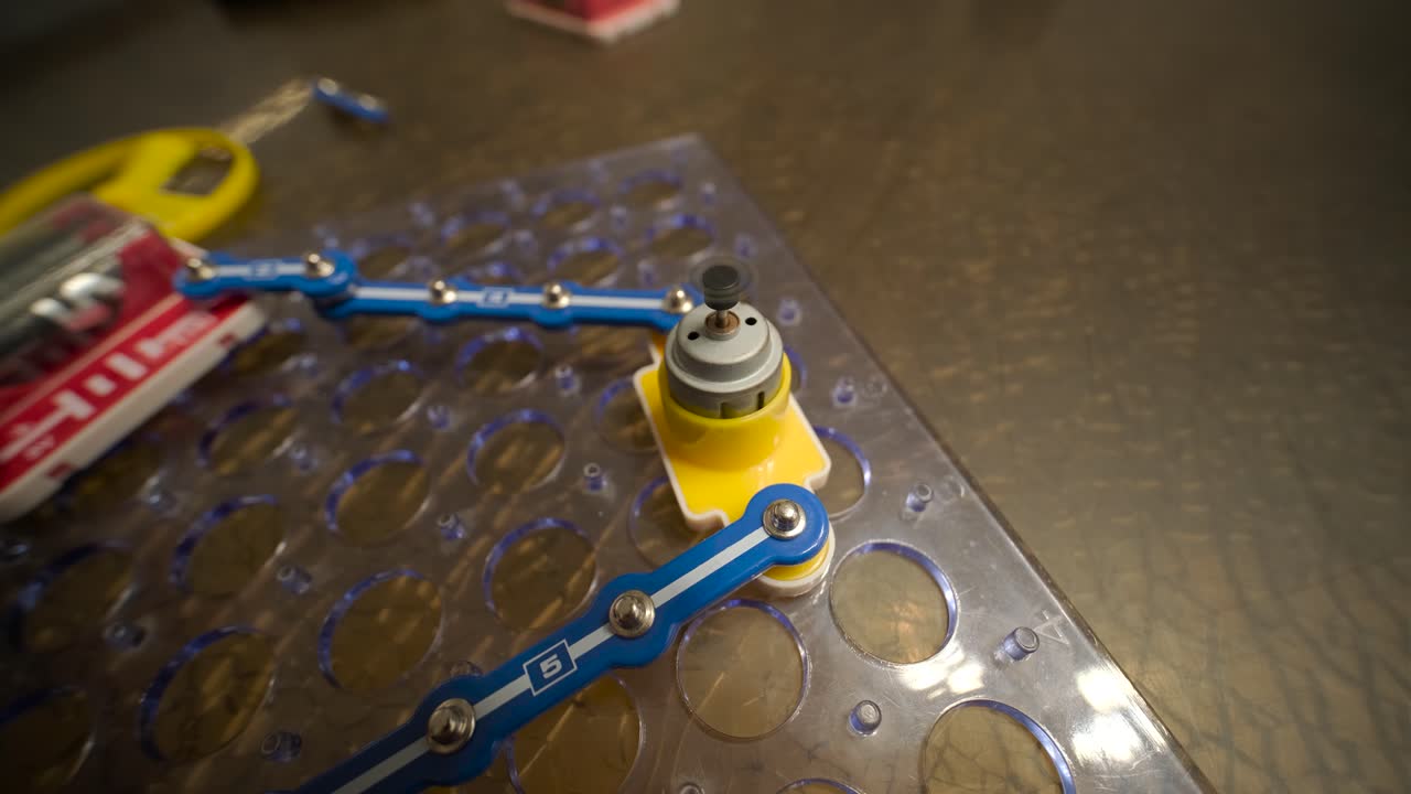 Small Motor with Propeller Spinning on an Electronics Kit