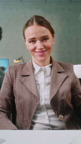 woman drinking coffee in office