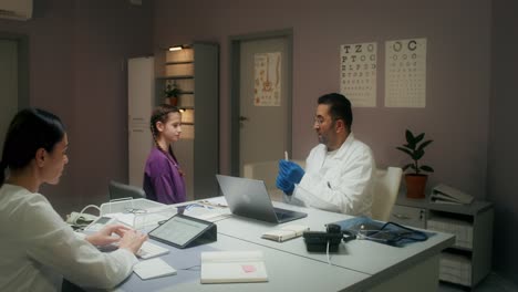 doctor examining a child patient