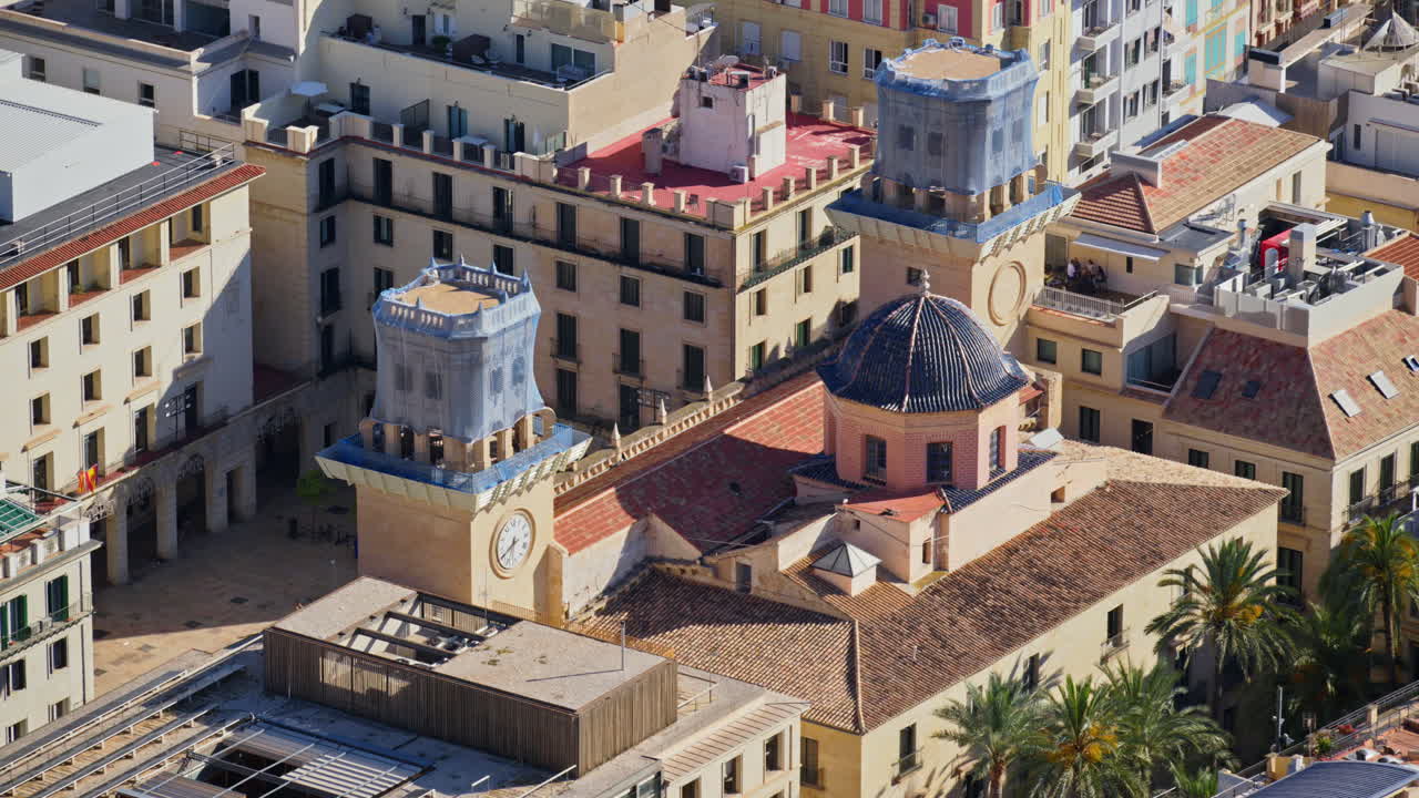 The blue-tiled dome and bell tower of Concatedral de San Nicolas de Bari rising above the old town's rooftops
