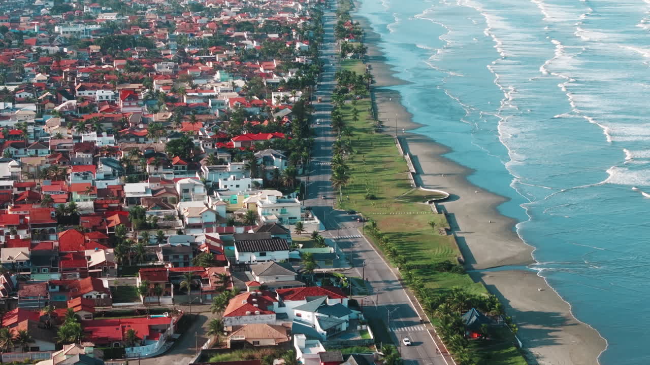 Aerial View of a Coastal City with Beach and Ocean