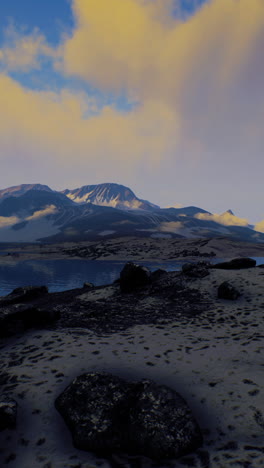 stunning landscape with snow-capped mountains and a calm lake