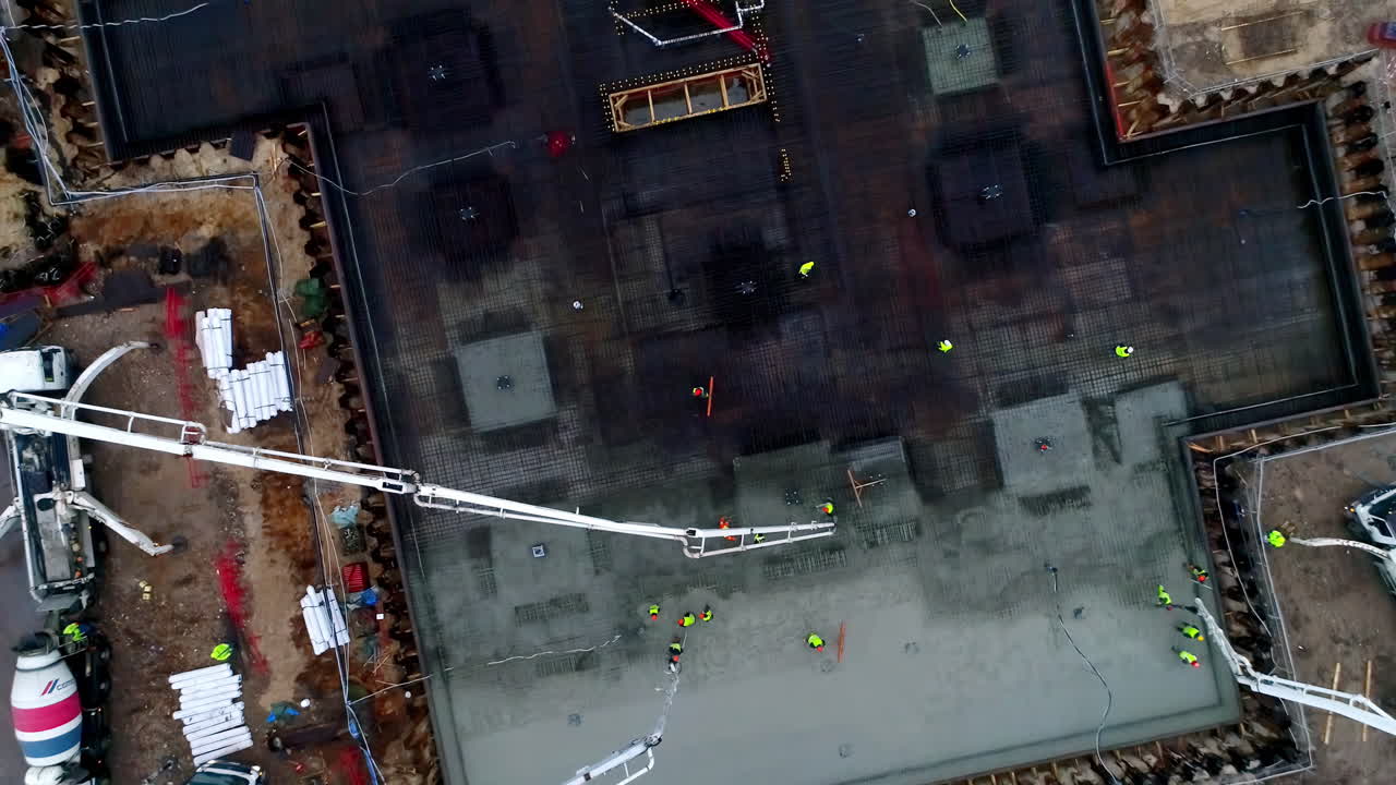 Aerial View of Concrete Pouring at a Construction Site