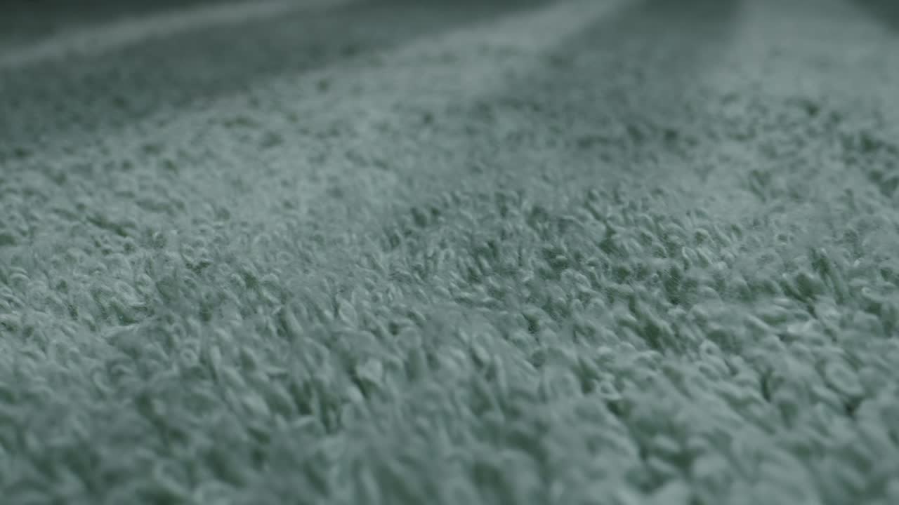 Closeup of a gray fuzzy carpet