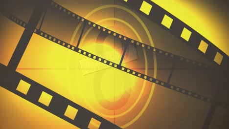 Animation-of-film-reels-moving-over-countdown-and-light-spots-against-yellow-background