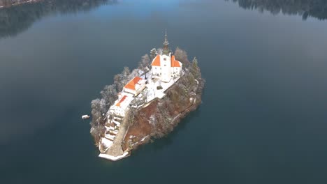 lake bled winter aerial view of the beautiful church on an island