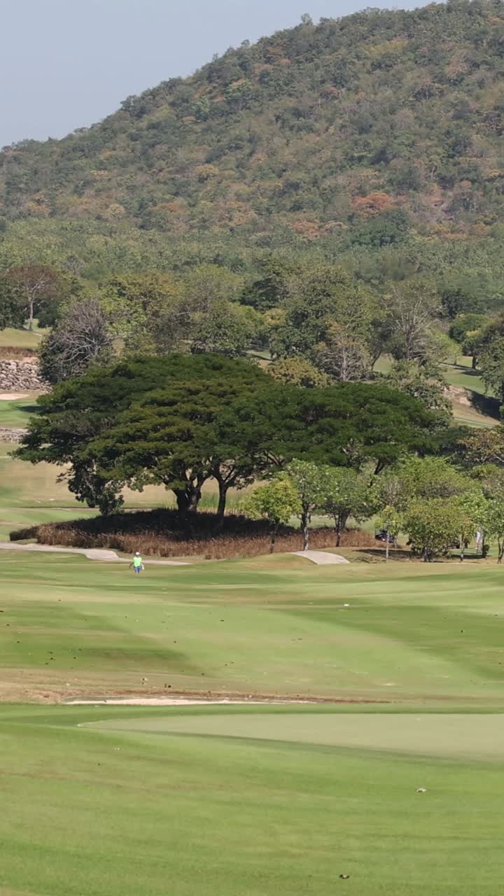 Golf Course Landscape with People