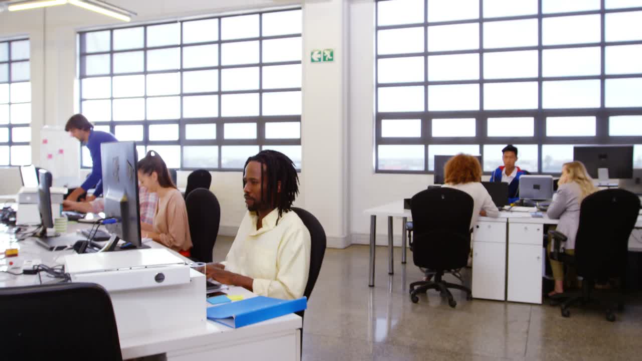 Female business executive holding document and smiling in conference room