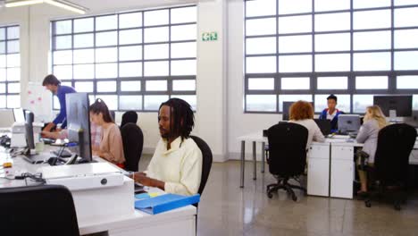 female business executive holding document and smiling in conference room