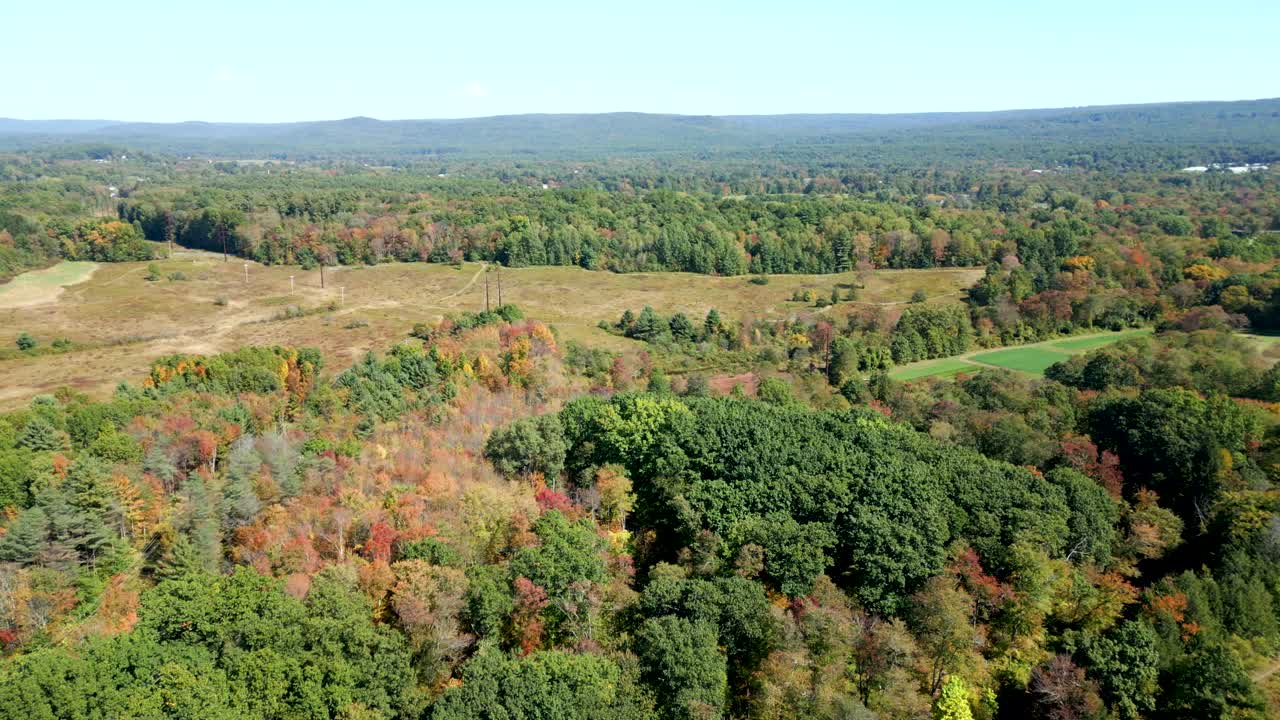 Aerial expansive view of countryside with forest, meadows and distant hills in Groff Park, Amherst, Massachusetts, USA