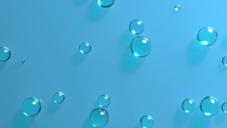 3d render of glass spheres moves like a water drops on blue plain.