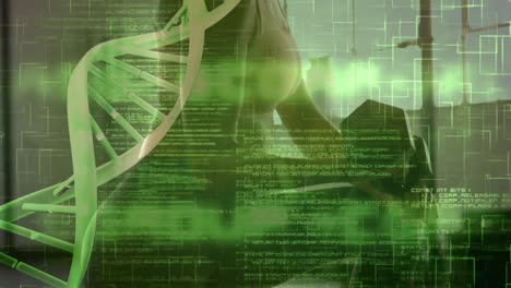 procesamiento de datos médicos contra la sección media de una mujer en forma trabajando con pesas en el gimnasio