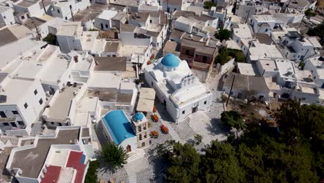 a beautiful aerial shot of a mountain village in paros, greece