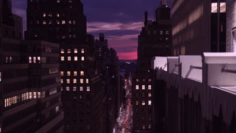 New-York-City-sunset-with-traffic-moving-below