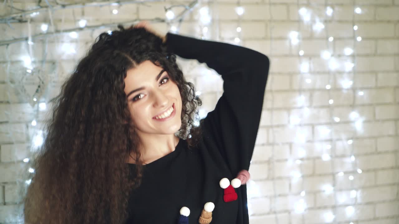 Portrait of Christmas woman. Christmas portrait of young woman in New Year interior