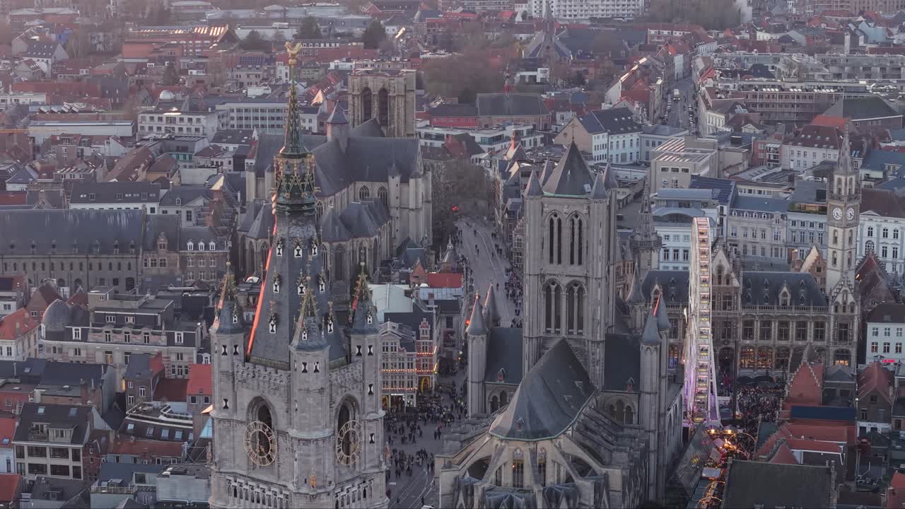 Stunning aerial drone view of Gent, featuring Het Belfort van Gent, Sint-Niklaaskerk, and Saint Michael's Church in the historic city center