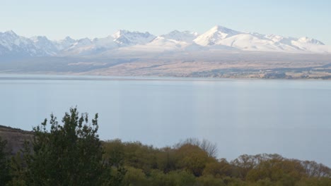 scenery of pukaki lake and mountains in south island, new zealand - wide shot