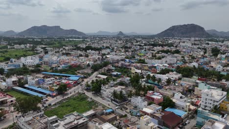 Aerial-footage-of-the-highway-intersecting-with-village-roads-and-rural-landscapes