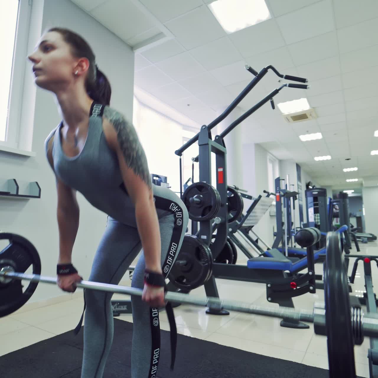 Sporty girls doing exercises in gym
