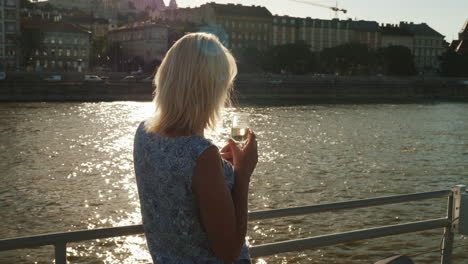 woman enjoys river cruise on the danube