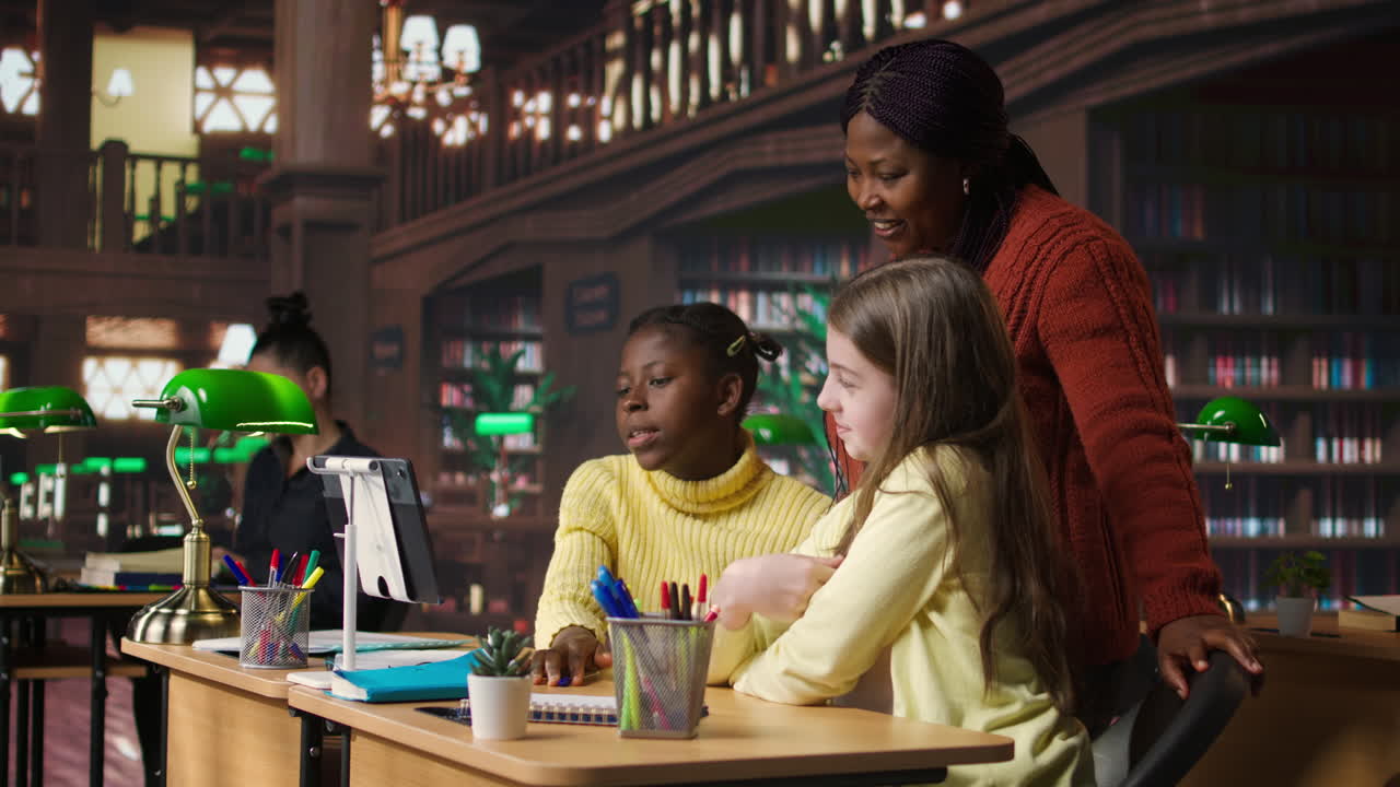 Students learning with a teacher in a virtual library setting