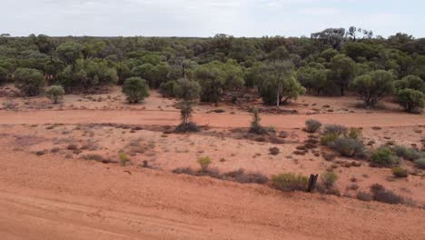 Drone-descending-in-the-Australian-Outback-showing-unsealed-road