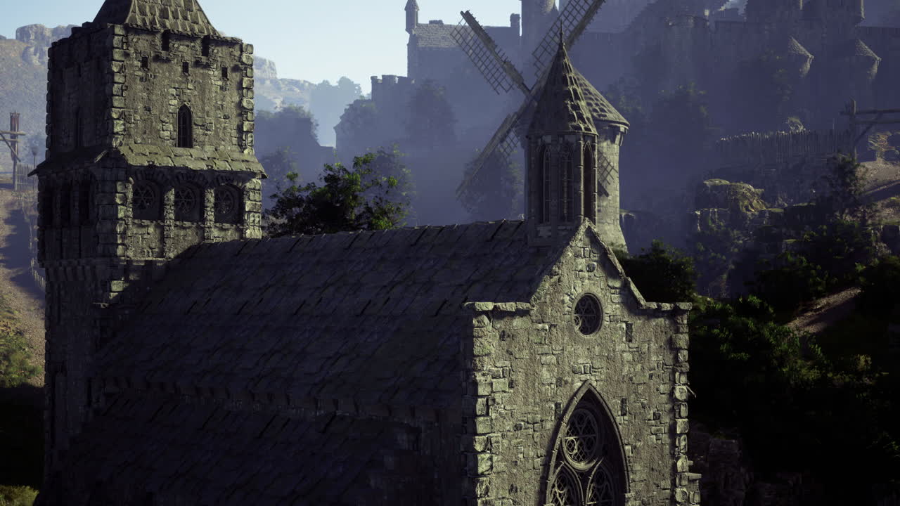 Iglesia histórica de piedra y ruinas de un castillo en un paisaje montañoso