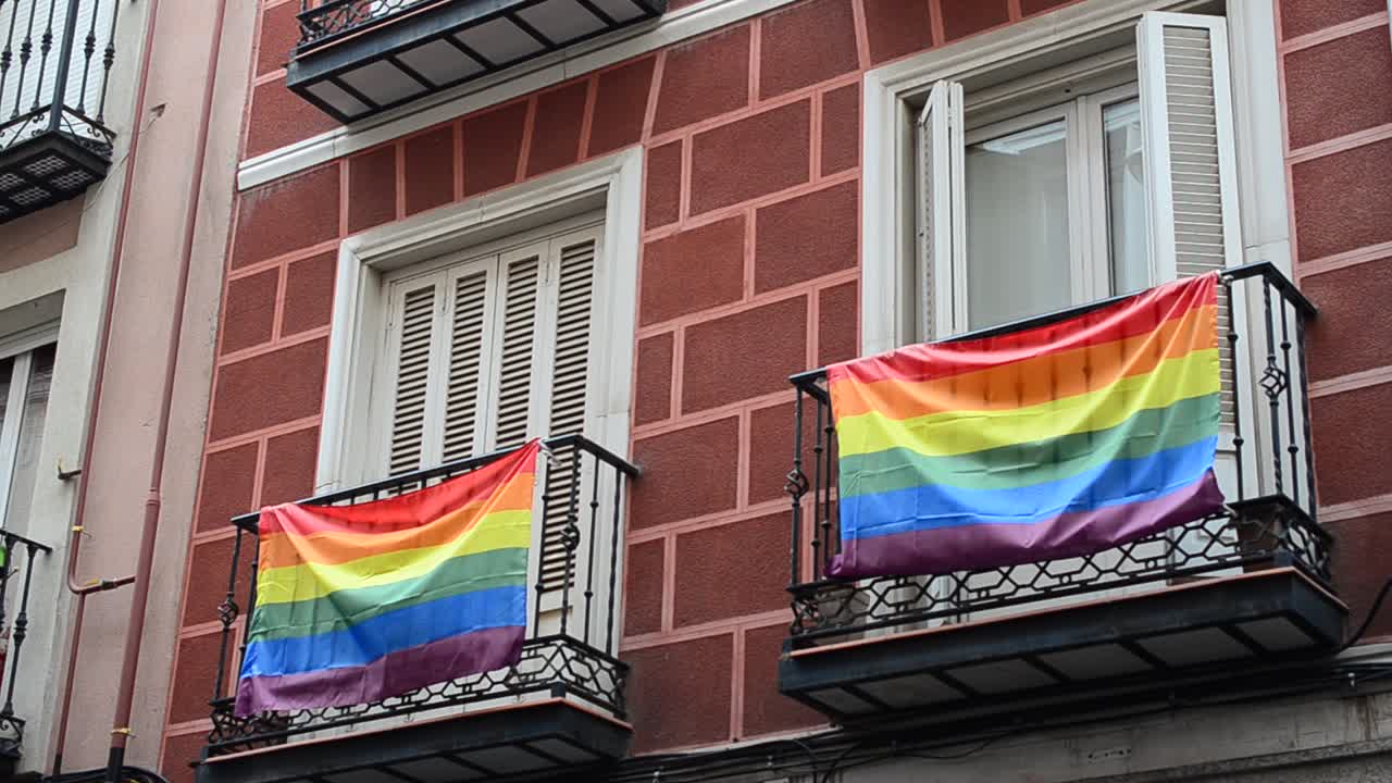 Rainbow flag (LGBT movement) on balconies in Madrid, Spain. Shooting in Madrid