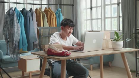 young person working online from home fashion business