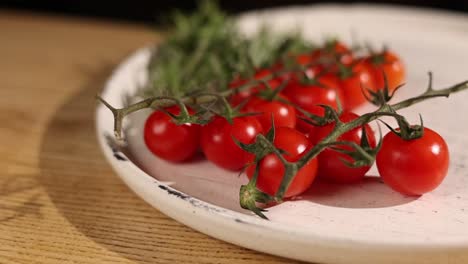 fresh cherry tomatoes on plate