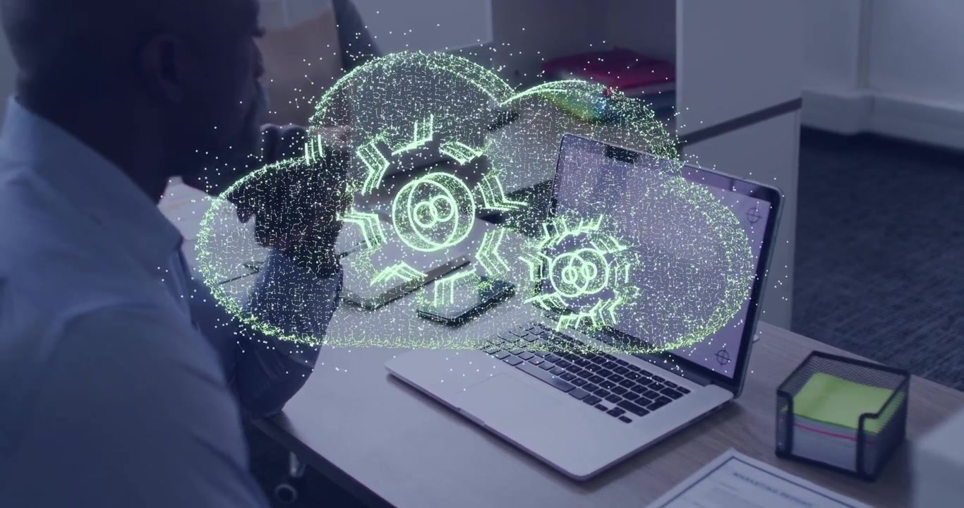Man watching laptop spark arising near phone forming cloud holo gears settling fading demoing tech