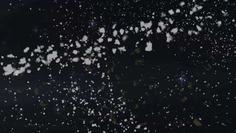 animación de estrellas y copos de nieve sobre fondo negro