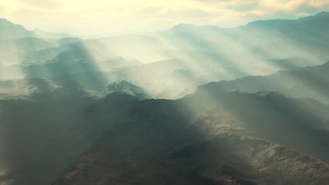 Paisaje-Desértico-Volcánico-Aéreo-Con-Rayos-De-Luz