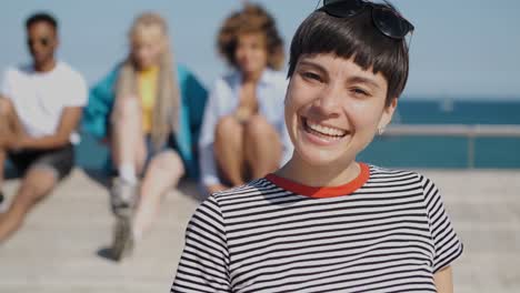 charming laughing woman in sunglasses