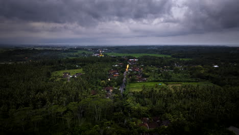 hyperlapse timelapse of cars driving along road in indonesian countryside at sunset