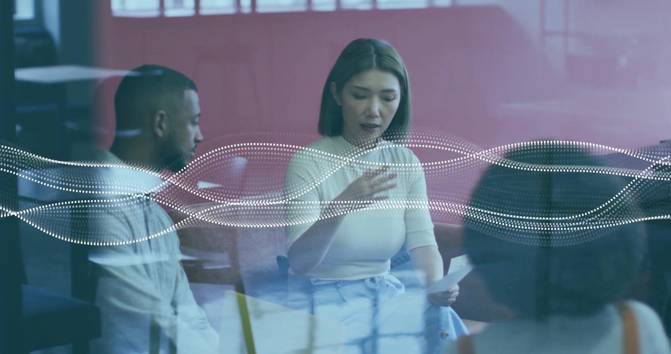 Woman reading paper seeking input and gesturing in business meeting while dotted waveform pulsing