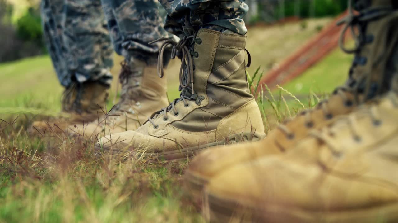 Low-section of military soldiers standing in line 4k