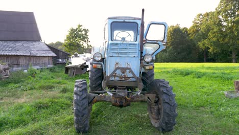 Moving-towards-close-up-camera-shot-of-old-soviet-tractor