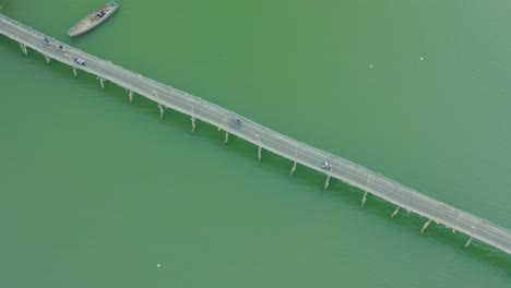 drone view the wooden bridge on cai river, nha trang city, khanh hoa province, central vietnam