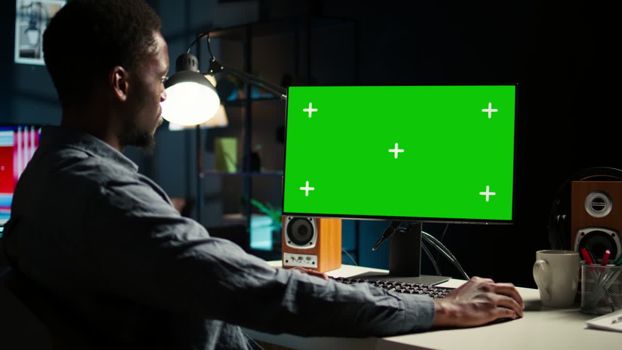 African american adult working from home using chroma key mockup