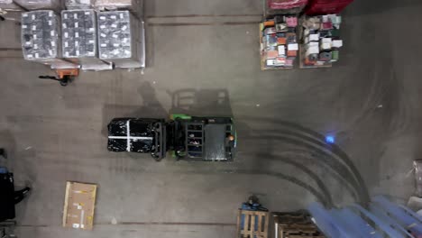 top down view on forklift transport pallet ready to shipment in busy warehouse